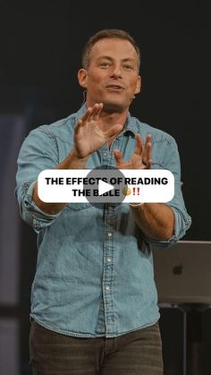 a man standing in front of a screen with the words the effect of reading on it