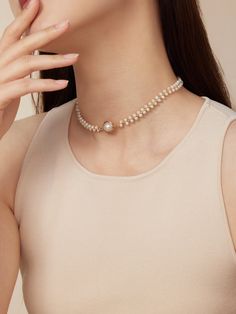 Introducing the COCOKIM Stargazer Choker. Timelessly elegant, it intertwines pearls and gold thread to create an everlasting allure. Fusing vintage charm with modern sophistication, pearls become the language of beauty, composing a poetic rhythm of elegance. Whether paired with professional attire or adding a touch of refinement to casual outings, you can always trust the timeless grace of the Classic Wrapped Series. Metal: 14k Gold Filled Pearl: Freshwater Pearls Chain Length: 350mm + 50mm adju Elegant Cream Jewelry With Pearl Pendant, Elegant Cream Jewelry For Evening, Elegant Beaded Yellow Gold Pearl Necklace, Elegant Cream Jewelry With Pearl Charm, Elegant Cream Pearl Jewelry, Elegant Yellow Gold Beaded Pearl Necklace, Minimalist Pearl Charm Choker Jewelry, Elegant Beaded Akoya Pearl Jewelry, Elegant Adjustable Pearl Choker