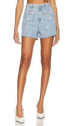 Find PATBO Hand-beaded Shorts In -light on Editorialist. PatBO Hand-Beaded Shorts in Denim-Light. - size 2 (also in 4, 8) PatBO Hand-Beaded Shorts in Denim-Light. - size 2 (also in 4, 8) 100% cotton. Made in Brazil. Hand wash. Zip fly with button closure. Front slip pockets. Denim fabric with faux pearl, bead and crystal embellishments throughout. Item not sold as set. Shorts measure approx 13.5 in length. PBTO-WF23. SHO25541US. PatBO is a Brazilian brand that captures the vibrant energy of Sout Denim Set, Vibrant Energy, Made In Brazil, Local Artisans, Crystal Embellishment, Light Wash Denim, Light Denim, Crop Jacket, Hand Beading