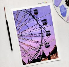 a painting of a ferris wheel with purple sky in the background and paintbrushes next to it