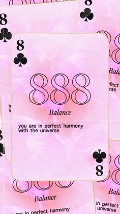 four playing cards with numbers and symbols on the front, one in pink and two in black