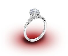 a diamond engagement ring on a red and white background