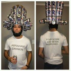 the man is wearing a t - shirt with beer cans on his head