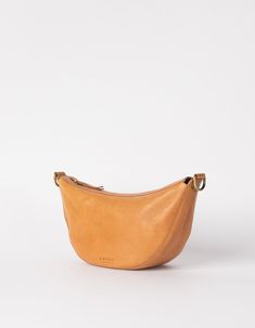 Say hello to Leo, the slouchy leather bag that fits all that you need for a busy day in town. Think of Leo as the cool sibling of our more structured Laura bag. Leo can be worn across the body as a bum bag, or on the shoulder as chic arm candy. Leo is unisex, catering to everyone who embraces that bumbag style. Leo comes in our wild oak soft grain leather, that timeless addition to any outfit. Do you want to wear Leo as a longer cross-body bag? Make sure to also add this strap to your cart. OMB- Versatile Hobo Bag With Smooth Grain For Everyday Use, Versatile Smooth Grain Hobo Bag For Everyday Use, Versatile Hobo Bag For Everyday Use With Smooth Grain, Versatile On-the-go Shoulder Bag With Smooth Grain, Everyday Satchel Hobo Bag With Smooth Grain, Everyday Hobo Satchel Bag With Smooth Grain, Everyday Leather Lined Hobo Shoulder Bag, Leather-lined Hobo Shoulder Bag For Everyday, Everyday Leather-lined Shoulder Hobo Bag