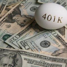 an egg sitting on top of money with the word 40k written in gold lettering