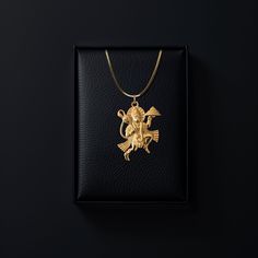 Elevate your faith with our 14k Gold Hanuman Pendant, symbolizing devotion and strength. This solid gold Hanuman necklace captures the essence of the Monkey God. This piece of jewelry is perfect for those seeking a unique and meaningful piece of Hindu faith. PENDANT INFORMATIONThis pendant is made of real, solid gold.• Made in USA• Material: 14k or 18k solid gold• Finish: polished• Height: 1.28" (32,5 mm) | *includes the small circle, bail dimensions not included• Width: 1" (25 mm)• Pendant weig Luxury Silver Temple Necklace, Ceremonial Spiritual Yellow Gold Temple Necklace, Yellow Gold Amulet Temple Necklace For Rituals, Yellow Gold Temple Necklace For Rituals, Gold Hanuman, Hanuman Pendant, March Crafts, Phoenix Pendant, Gold Dragon