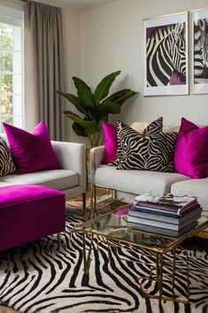 a living room filled with furniture and a zebra print rug