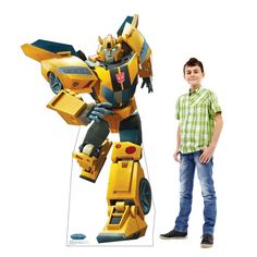 Bring your Transformers party to life with Bumblebee! You'll create an action-packed event when you stand him up in the entry way or next to the gift table. Planning a Transformers viewing party? Bumblebee is ready and rumbling to make your occasion bright and vibrant. Cardboard. 43" x 73" Simple assembly required. Stand-ups are one-sided with a brown cardboard back. © HasbroSpecial Shipping Information: This item ships separately from other items in your order. This item cannot ship to a P.O. B Bumble Bee Transformers Birthday Party, Earthspark Bumblebee, Baby Activities 1 Year, Transformers Earthspark, Transformers Party, Transformers Birthday Parties, Transformer Party, Bumblebee Transformers, Transformer Birthday