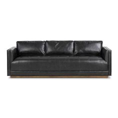 a black leather couch with wooden legs