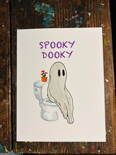 a card with an image of a ghost coming out of a toilet and the words spooky dobby on it