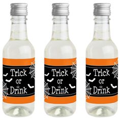 three halloween water bottles with trick or drink labels