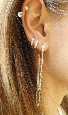 This is a pair of dainty huggie hoops with 2 draping chains. The huggie hoop is rimmed with ziron gemstones on the front and back of huggie. 2 different length chains draped off the huggie. Sold as a pair. Available in 14k gold plated and sterling silver. Materials: *925 sterling silver *14k gold plated *Sparkles: zircon gemstones Measurements: *Longest chain hangs down 2 5/8 inches Chain Hoop Earrings, Earrings Double, Earrings Chain, Chain Earring, Diy Jewlery, Double Chain, Dainty Earrings, Chain Earrings, Dainty Jewelry