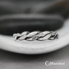 a close up view of a silver ring