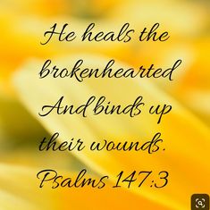 a yellow flower with the words he heals the brokenhearted and binds up their bounds