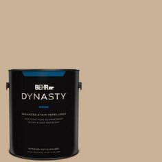 a black paint can with the words dynastiy on it's side