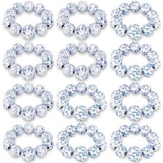 six pieces of clear and white diamond jewelry on a white background with clippings