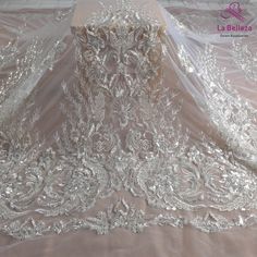 Price: The price is for 1 yard. if you buy more than 1 yard, it won't be cut. will come in one piece the longest is 20 yards. Material: polyester, sequins, beads Fixed Wide : 130cm or 51 inches. color: Silver Want to see other colors and more similar Beading lace fabrics come to: https://www.etsy.com/shop/Randyfabrics?ref=hdr_shop_menu&section_id=14192305 Shipping: Choose the shipping way you need, if you want the package shipped by express, please note the phone number on order. Use for Dre Beading Wedding Dress, Off White Wedding Dresses, Beaded Fabric, Silver Gown, White Lace Wedding Dress, Wedding Dress Patterns, Lace Fabrics, Evening Dresses For Weddings, 2021 Fashion