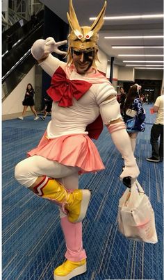 a person in costume is posing for the camera while holding two bags and wearing yellow shoes