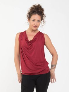 Loose, soft and comfy, our lightweight rayon jersey tunic is fitted at the hips and can be worn as a tunic with leggings, or bunched at the waist with jeans or any skirt or pants. This sophisticated top drapes well on a variety of figures. Classy enough for the office under a jacket or on it's own. [#details] Size Suggestions S/M: 2-6 M/L: 8-12 [/details] [#fabric] Lightweight Rayon Lycra: 90% Rayon (Viscose) / 10% Spandex (Lycra) [/fabric]