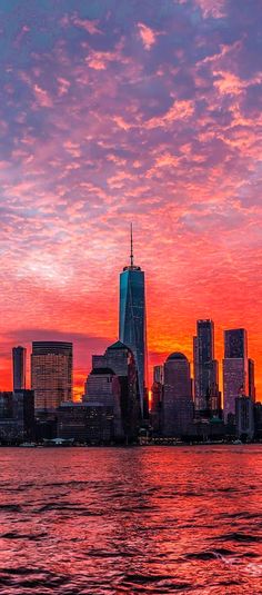 the sun is setting over new york city