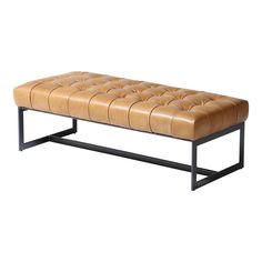 a brown leather bench sitting on top of a metal frame