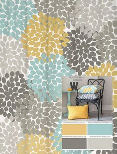 a room with yellow and gray flowers on the wall