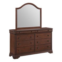 a dresser with a mirror on top of it