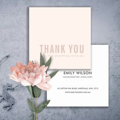 a thank card with pink flowers and greenery