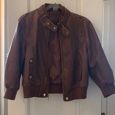 See Pics. Cool Brown Leather Look. Large. No Rips Or Marks. Never Worn. Brown Faux Leather Outerwear For Fall, Fall Brown Faux Leather Outerwear, Fitted Brown Faux Leather Outerwear, Casual Brown Faux Leather Outerwear, Brown Faux Leather Jacket, Cool Brown, Faux Leather Jacket, Faux Leather Jackets, Leather Jackets