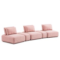 three pink couches sitting next to each other