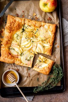 an apple tart with sliced apples on top