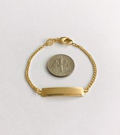 "18K GOLD FILLED BABY ID BRACELET...5.5\" Long FREE GOLDEN GIFT POUCH INCLUDED 18K BANO DE ORO PULSERA CON PLACA PARA BEBE . 5.5\"LONG BOLSA DE REGALO GRATIS" Medical Bracelet, Id Bracelets, Pompano Beach, Gift Pouch, Link Bracelets, Gold Filled, Gold Bracelet, 18k Gold, Medical