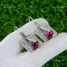 Add a heritage touch in your everyday look with this auspicious 925 Sterling Silver Earrings with Red Bloodstone. Makes a perfect indulgence so grab it today. Welcome to Orabelornaments ! Natural Red Bloodstone Earrings For Girls, Drop & Dangle Earrings, Pear Gemstone Earrings, Handmade Earrings, Natural Gemstone Earrings Description :- SKU:- ET-140 Metal:-  Sterling Silver Metal Purity:- 925 Gemstone:- Red Bloodstone Gemstone Color:- Red Gemstone Shape :- Pear Gemstone Creation :- Natural Stone Bloodstone Ring, Vintage Earring, Pink Star, Red Gemstones, Drop Dangle Earrings, Silver Style, Handcrafted Earrings, Silver Earring, Sterling Silver Earrings Studs