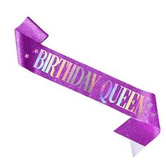 a purple birthday queen ribbon with stars on it