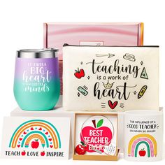 the teacher appreciation gift set includes two mugs, a tea bag and an apple