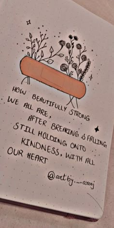 a notepad with a drawing of a hot dog on it's side and the words, not beautifully strong