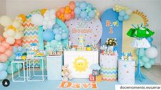 a birthday party with balloons and decorations