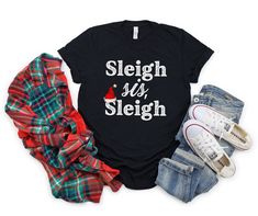 Funny Christmas Shirt, Black Girl Christmas, Sleigh All Day, Black Santa, Slay All Day, African American, Black Christmas Tee Holiday TShirt BE SURE TO CHECK SIZING CHART SO YOU CAN CHOOSE THE RIGHT SIZE FOR YOUR PREFERRED FIT. Our solid color unisex tees are super soft ring-spun cotton with just the right amount of stretch. Because they are unisex, they may be a bit loose on some ladies, or more fitted for some men, depending on body type and preference of fit. We use premium name brands like B Santa Slay, Funny Santa Shirts, Xmas Outfit, Christmas Gifts For Nurses, Slay All Day, Black Santa, Christmas Tshirt, Christmas Sleigh, Santa Shirts