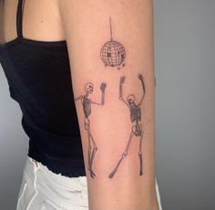 skeletons dancing under disco ball tattoo upper back arm large sparkles boogie Dancing Skeleton Disco Ball Tattoo, Disco Ball Tattoo, Arm Tattoo Designs, Ball Tattoo, Hummingbird Tattoo, Minimalist Tattoos, Tattoo Project, Line Art Tattoos