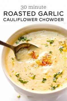 a bowl of roasted garlic cauliflower chowder on a white background with the text 30 minute roasted garlic cauliflower chow