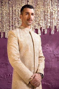 Royal Embroidered White Sherwani Pakistani Groom Dress comes in premium quality fabric. Luxury designs and embellishments give a glamorous touch to this perfectly stitched Men Sherwani, making it your priority for the wedding day. Sherwani: Pakistani Men Sherwani is emblazoned with luxury designs and embroidery work. Beaming pearls and goldwork enhance the traditional look of this Sherwani Dress. The fabric of this Sherwani is karandi, making it a charming choice for the big day. Trousers: This Pakistani Groom Dress, Sherwani Pakistani, Wedding Suits Men Blue, Pakistani Men, Men Sherwani, 23 Fashion, Mens Sherwani