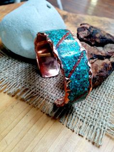 *  Molten Copper Cuff.  Turquoise and Coral Mixed.*  1.6mm Heavy Copper Used.  Molten Edges 3mm high.*  Waxed and Polished.  Lacquered will be done by the Request.*  Mark your wrist size on the option.  Other sizes will be done by the Special Request. Turquoise Patina Cuff Bracelet As A Gift, Turquoise Cuff Bracelet With Patina As A Gift, Handmade Wide Band Cuff Bracelet As Gift, Handmade Wide Band Cuff Bracelet For Gift, Artisan Turquoise Cuff Bracelet As Gift, Handmade Copper Bracelet, Copper Uses, Copper Bracelets, Copper Crafts