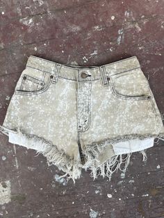 Bleached Levi's denim shorts, fits size 26/27 best. Found these denim Levi's shorts at a thrift store in high school and decided to try and give them a facelift. Tag says waist is a size 30, but these have shrunken a bit. These shorts are short, so they show a bit of booty.  If you have questions or would like exact measurements, just message me. All sales are final. Grunge Style Relaxed Fit Cotton Jean Shorts, Grunge Relaxed Fit Cotton Jean Shorts, Grunge Cotton Relaxed Fit Jean Shorts, Grunge Cotton Jean Shorts With Relaxed Fit, Grunge Style Relaxed Fit Jean Shorts, Cotton Cutoff Grunge Shorts, Trendy Acid Wash Cotton Jean Shorts, Grunge Cutoff Cotton Shorts, Faded Washed Jean Shorts