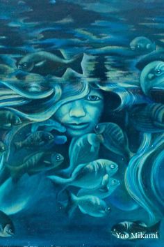 a painting of a woman surrounded by fish