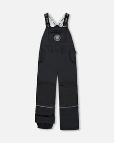 Little ones will be warm and dry if they're wearing our Overall Snow Pants Black! Insulated for warmth in frigid temperatures, these weather-resistant overalls feature an adjustable waistband, adjustable logo straps, adjustable hems to add length as they grow, and ankle snow guards to keep the snow out. They're a must-have for kids who love to be outside during or after a fresh snowfall! Fabric coated with a Polyurethane coating (5000mm/5000g/m²/24hr) for weather resistance and moisture-wicking Black Waterproof Winter Pants, Functional Black Winter Pants, Black Winter Hiking Bottoms, Waterproof Black Pants For Skiing, Waterproof Black Skiing Pants, Black Pants For Winter Sports, Functional Winter Pants For Outdoor Work, Winter Waterproof Utility Bottoms, Winter Utility Waterproof Bottoms