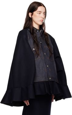 Non-stretch denim and wool melton cape-style jacket. · Paneled construction · Spread collar · Button closure · Pleats at front · Flap pockets · Flared hem · Press-stud vent at side seams · Padded shoulders · Drawstring at interior · Full cupro satin lining · Contrast stitching in tan Supplier color: Indigo/Navy Workwear Cape With Pockets, Fall Workwear Outerwear With Cape Sleeves, Cape Jacket, Cape Style, Press Studs, Contrast Stitch, Stretch Denim, Coats For Women, Cape