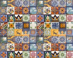 a colorful tile pattern with flowers on it