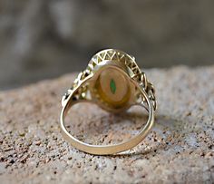 "Estate Vintage JADEITE Oval Cabochon 14k Gold YLK size 6 1/4 size 6 1/4 This ring contains (1) Natural Oval Old Mine Deep Green Cabochon Jadeite Center Stone. Measuring: approximately 14.35 X 9.35 X 2.60mm The Ring is Yellow Gold ... Stamped 14K Y.L.K. The Jadeite is Set with Four (4) Prongs in the Center. The Shank is : Width: approximately 2.22mm Jadeite is among the most valuable of all gemstones. Jade is considered the \"Stone of Heaven\" and is thought to provide a bridge between this worl Victorian Oval Emerald Ring In Yellow Gold, Victorian Oval Yellow Gold Emerald Ring, Antique Gold Emerald Ring With Oval Cabochon, Antique Emerald Ring In Gold With Oval Cabochon, Antique Yellow Gold Oval Cabochon Opal Ring, Gold Oval Cabochon Emerald Wedding Ring, Gold Emerald Oval Cabochon Ring For Wedding, Gold Emerald Wedding Ring With Oval Cabochon, Art Deco Gold Opal Ring