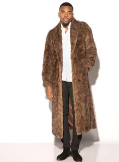 THIS MINK FUR COAT IS OUR #1 BESTSELLER FOR MEN! This full length mink fur coat is masculine, elegant, and warm! It's the perfect fur coat for any man searching for the best coat that's versatile enough to wear with slacks or jeans, or over your best tux! It has been handcrafted in a sculptured pattern and accentuated with a shawl collar. It has been dyed in your choice of ranch, mahogany, or demi buff. Dye added Fur Origin: Denmark Made in Greece Stock # : 193162 Length : 54 inches Dye added Mu Luxury Mink Colored Outerwear For Formal Events, Luxury Long Fur Coat, Formal Faux Fur Outerwear In Mink Color, Luxury Mink Long Coat, Luxury Long Mink Coat, Luxury Mink Color Long Fur Coat, Luxury Long Fur Coat For Formal Occasions, Luxury Long Formal Fur Coat, Fitted Mink Long Fur Coat