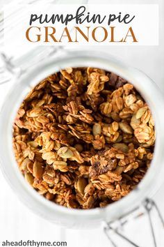 pumpkin pie granola in a glass jar with text overlay that reads, pumpkin pie granola